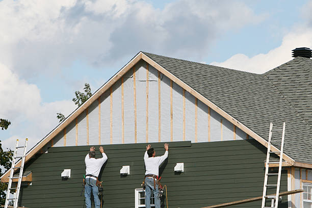Professional Siding Installation technician working in Glenside, PA